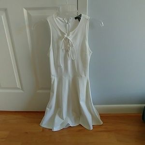White lace up dress with flare bottom